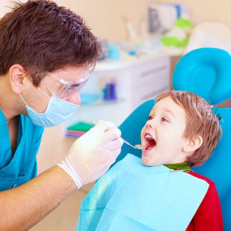 Smiling child during dental checkup